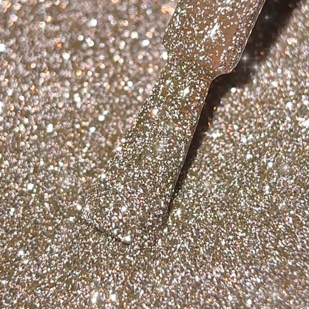 BIBLIOTEKA Esmalte reflectante Nº 05 Skin Glow — Oro frío, 10 ml